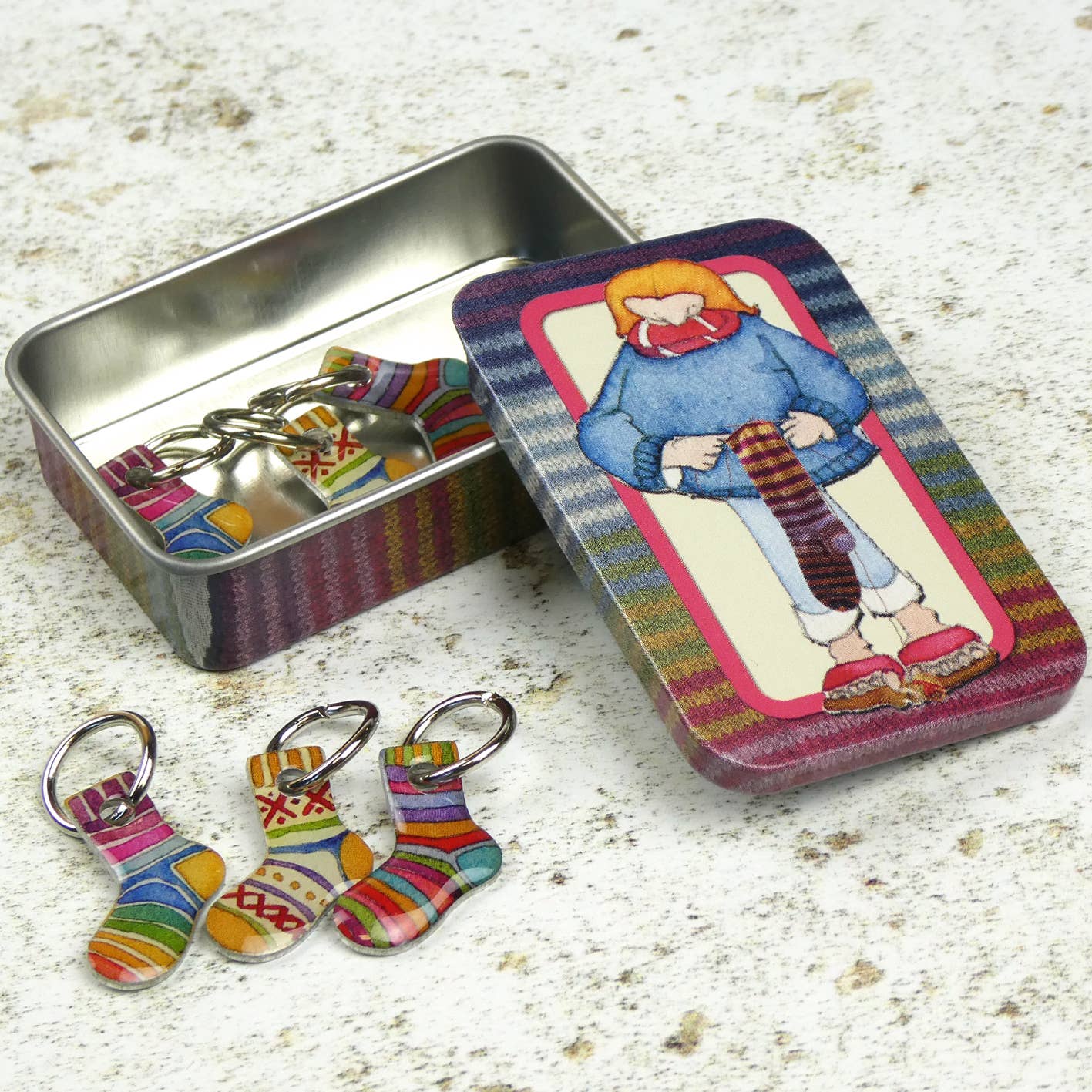 Socks Stitch Markers In A Tin by Emma Ball